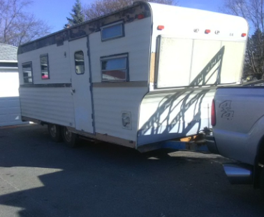 1970 vintage camper trailer and truck